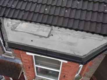 Why you should have a survey carried out image 2 - Patched up roof
