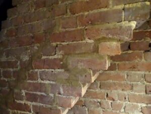 Brickwork falling from chimney