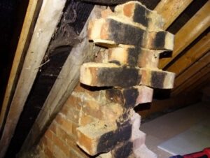 Loose brickwork in loft